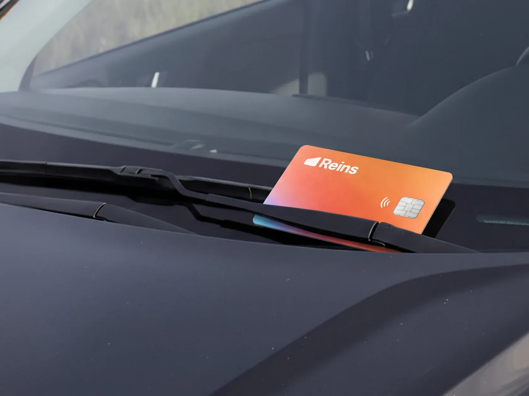 A spend limit sticker on a vehicle windshield