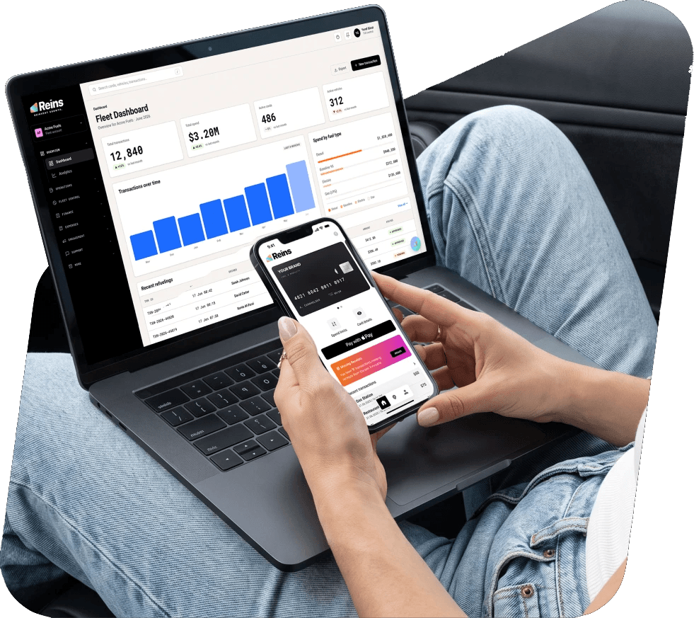 Fuel retailer reviewing the Reins dashboard on a laptop and phone
