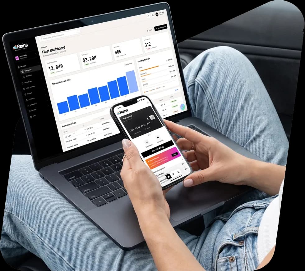 Fuel retailer reviewing the Reins dashboard on a laptop and phone